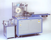 CD, DVD, audio cassette and video cassette overwrap machine.